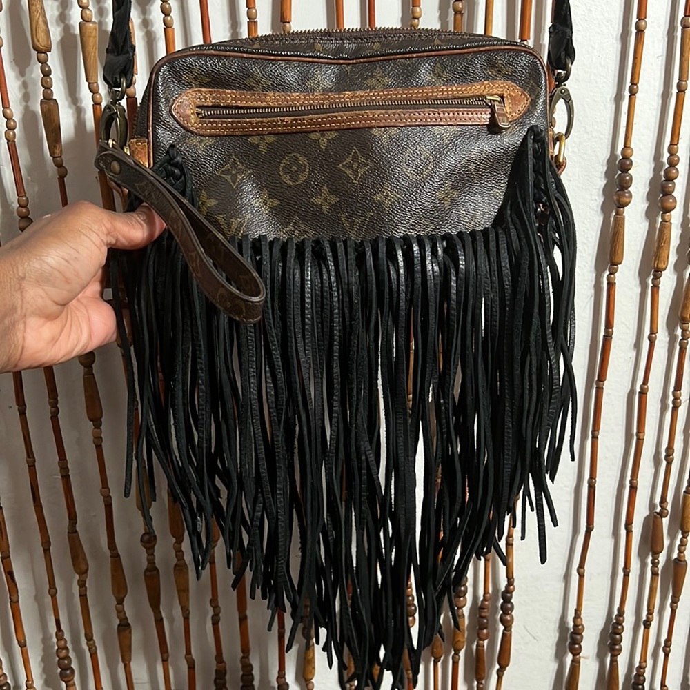 Louis Vuitton cross body from Vintage Boho Bags